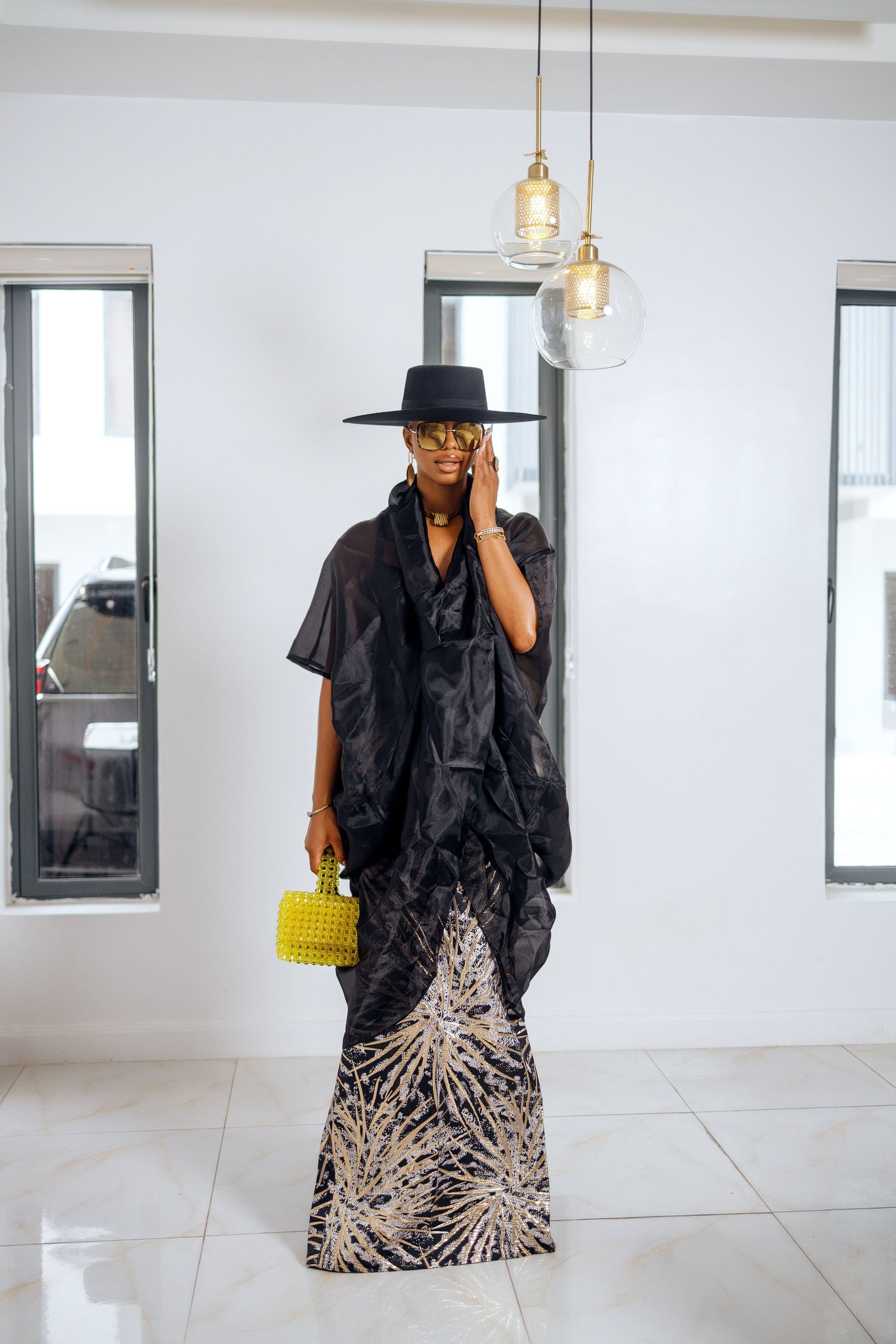 Black Samira Set (organza top with brocade skirt) from Nahota Kanma, featuring a draped top and elegant silhouette.